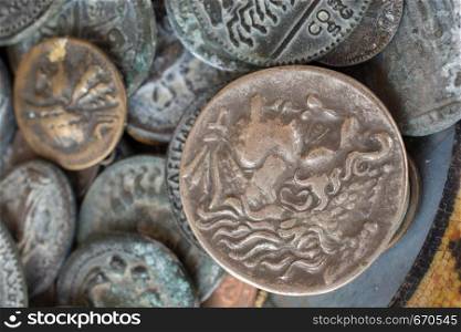 Antique metal coins collectiion as a background
