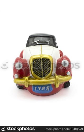 Antique model car on a white background.