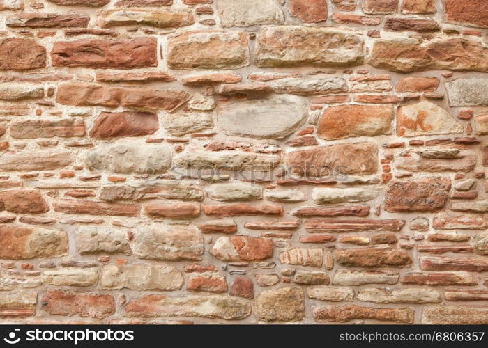 Antique natural stonewall, old stones in different sizes