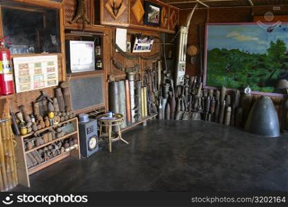 Antique objects displayed in a room, Phonsavan, Laos