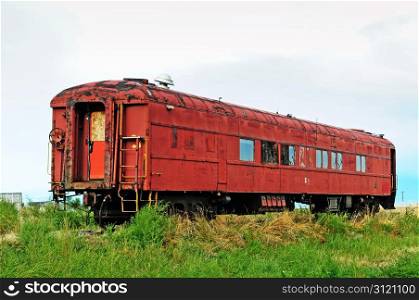Antique passenger railcar abandoned and forgotten