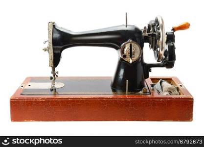 Antique sewing machine isolated on white background
