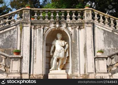 antique staircase and statue in Ajuda garden in Lisbon, Portugal