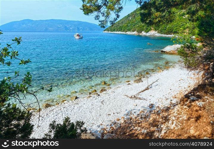 Antisamos beach. Summer sea view with boat (Greece, Kefalonia).