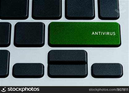Antivirus Text on Laptop Green Keyboard Button. Theme of Online Security and Internet Security. Data Privacy Terms.