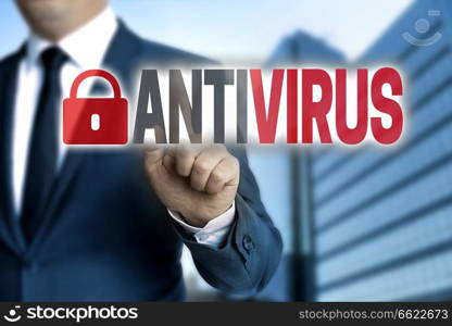 Antivirus touchscreen is operated by businessman.. Antivirus touchscreen is operated by businessman