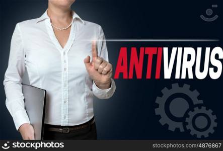 antivirus touchscreen is operated by businesswoman background. antivirus touchscreen is operated by businesswoman background.