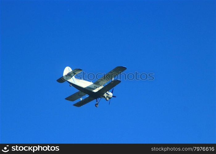 Antonov An-2 in the blue sky. plane Antonov An-2 flying in the air