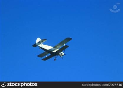 Antonov An-2 in the blue sky. plane Antonov An-2 flying in the air