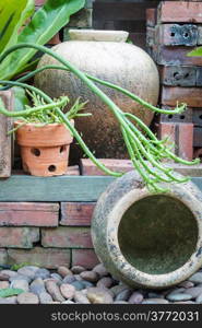 Apart of garden decorated with earthen jar