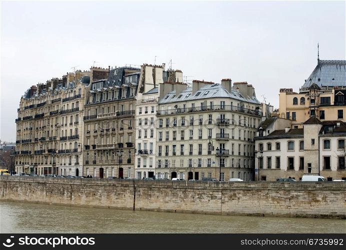 Apartment buildings beside the River Seine, Paris, France