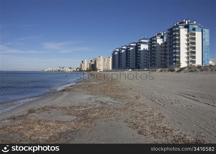 apartment buildings typical tourist on the beach of the Mediterranean coast