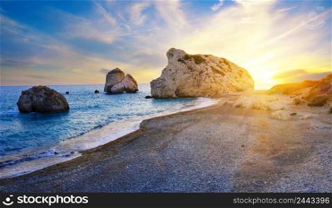 Aphrodite&rsquo;s beach and stone at sunset in bright sunshine. The main attraction of Cyprus. The symbol of lovers. A popular tourist destination. Paphos, Limassol, Cyprus. Aphrodite&rsquo;s beach and stone at sunset in bright sunshine