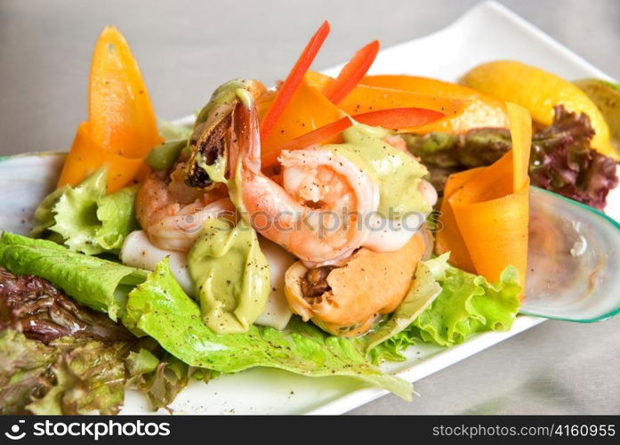 appetizer closeup dish of seafood and vegetables