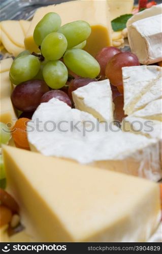 appetizer from cheese and grape