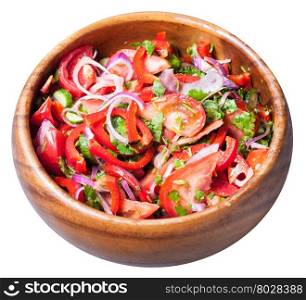 appetizer of fresh tomatoes, cucumbers, red onion seasoned by olive oil in wooden bowl isolated on white background