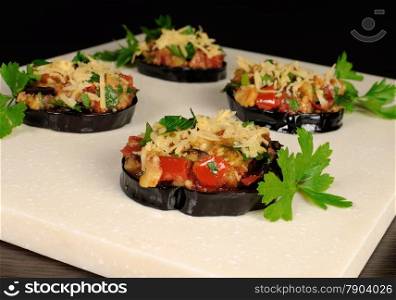 Appetizer of fried eggplant stuffed with vegetables and cheese