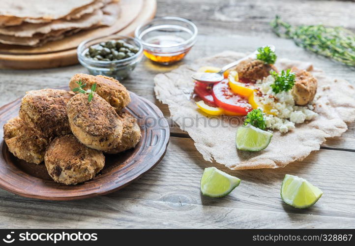 Appetizer with falafel, cottage cheese and vegetables