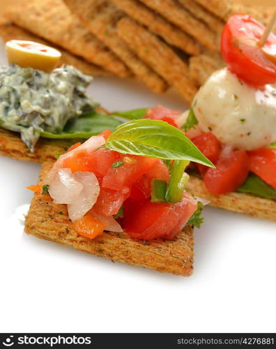 Appetizers With Crackers,Dip ,Vegetables And Mozzarella Cheese