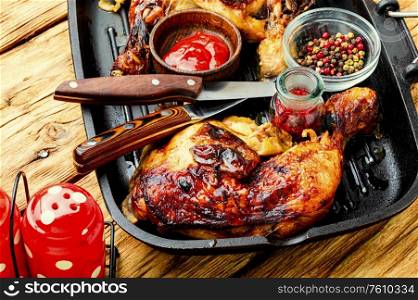 Appetizing chicken cooked in a grill pan.Popular meat food. Grilled chicken in a pan.