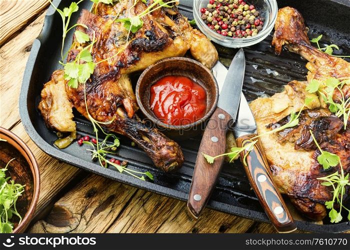 Appetizing chicken cooked in a grill pan.Roasted chicken fillet. Grilled chicken in a pan.