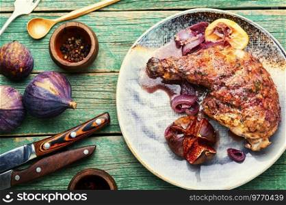 Appetizing chicken thigh roasted with autumn figs. Chicken grilled with figs