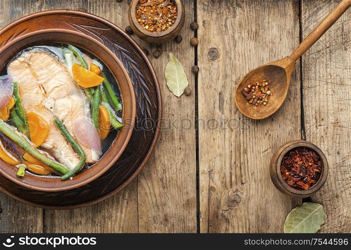 Appetizing dietary boiled salmon or trout.Boiled salmon fillet. Tasty salmon broth.