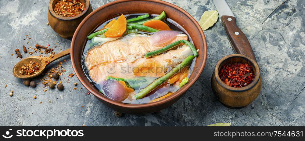 Appetizing dietary boiled salmon or trout.Fish soup.Long banner. Boiled salmon fillet