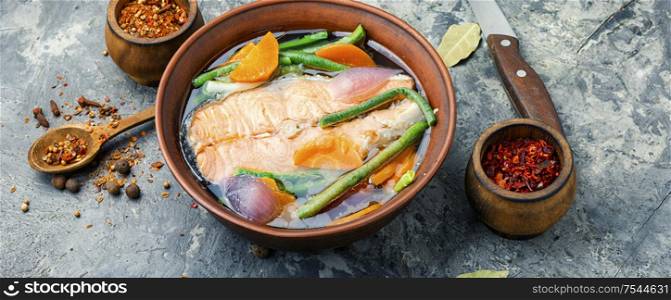 Appetizing dietary boiled salmon or trout.Fish soup.Long banner. Boiled salmon fillet