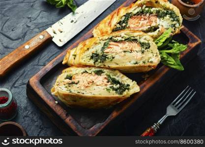 Appetizing fishπe made from salmon fish, rice and sπnach. Red fishπe.. Salmon baked in dough.