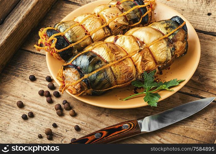 Appetizing fish roll made from smoked mackerel.Seafood. Hot smoked scomber