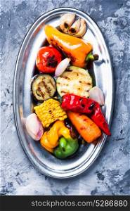 appetizing grilled vegetables. grilled vegetables on a fashionable metal plate