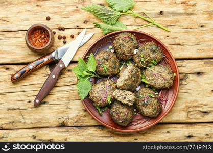 Appetizing homemade nettle meatballs cooked in the oven. Homemade fried cutlets,meatballs