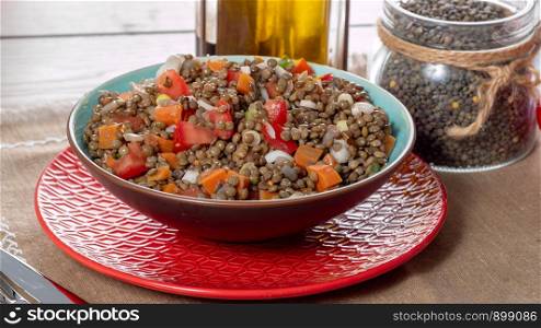 appetizing lentil salad with tomatoes and onions