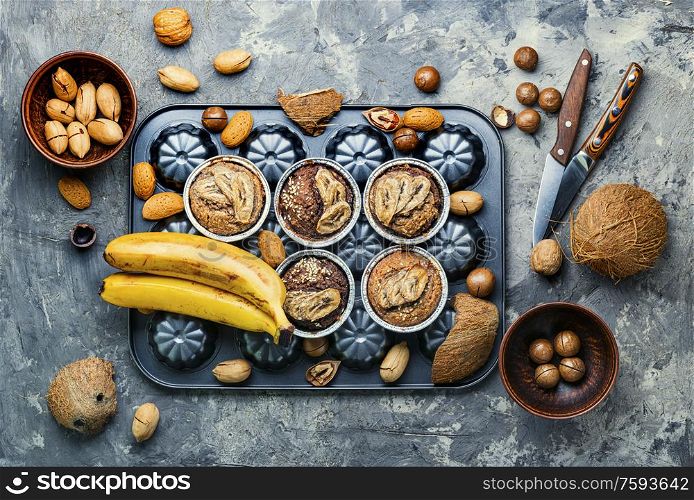 Appetizing muffins with banana, nuts and coconut.. Banana muffins with nuts.