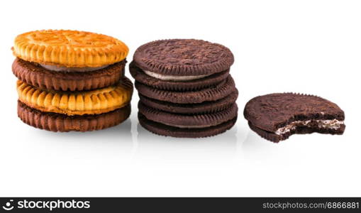 Appetizing round cookies with cream filling on white background