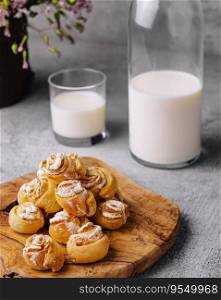 Appetizing ruddy buns-roses and milk bott≤