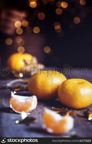 appetizing tangerines close-up on the table. Christmas card