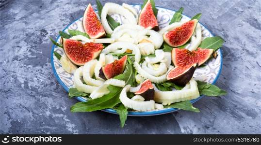 appetizing vegetarian salad with figs, grapes and fennel. vegetarian salad with figs