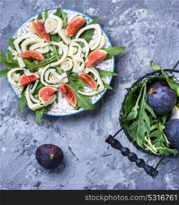 appetizing vegetarian salad with figs, grapes and fennel. vegetarian salad with figs