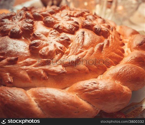 Appetizing wedding loaf - close up. Photo toned.