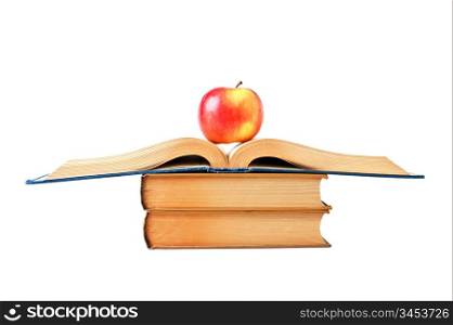 apple and an open book isolated on white