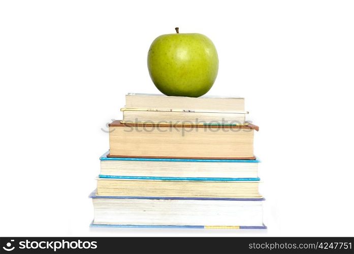 apple and stack of books for school