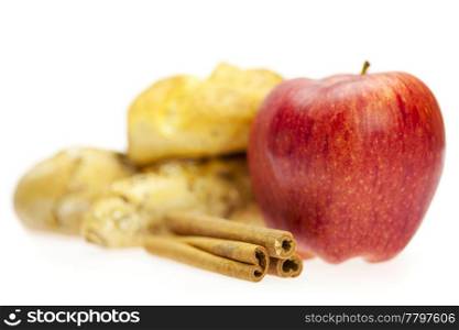 apple, bread and cinnamon isolated on white