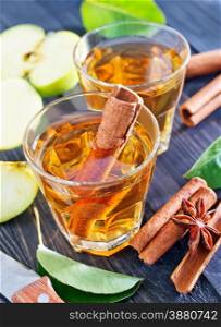 apple cider with cinnamon in the glass