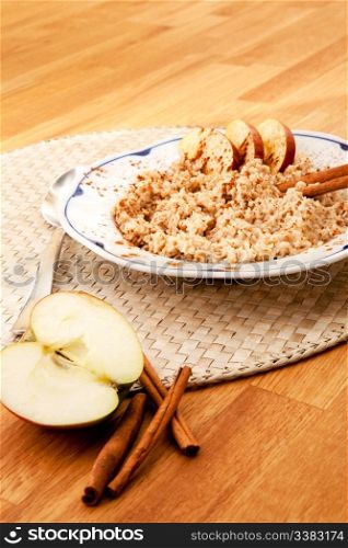 Apple Cinnamon Porridge - shallow depth of field with focus on the bowl