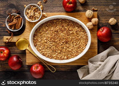 Apple crumble with oatmeal, walnuts and cinnamon. Top view