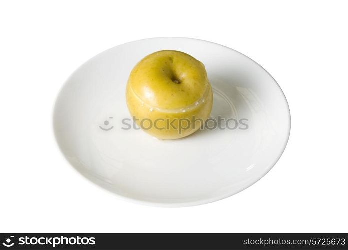 Apple dessert at plate isolated on white