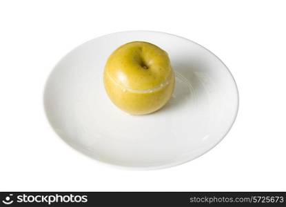 Apple dessert at plate isolated on white