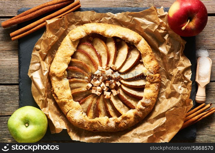 Apple galette over rustic background